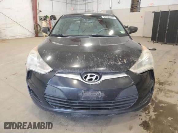 2012 Hyundai Veloster w/Black Int z VIN KMHTC6AD6CU043856, wystawiony jako Copart lot #53052335 z przebiegiem 170 035 mil mil oraz Czysty tytuł • Clean title. Historia ofert i sprzedaży dostępna na DreamBid. Obrazek 5.
