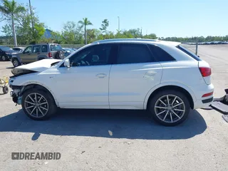 2018 Audi Q3 Premium Plus z VIN WA1JCCFS3JR028436, wystawiony jako IAAI lot #42067256 z przebiegiem 63 722 mil mil oraz . Historia ofert i sprzedaży dostępna na DreamBid. Obrazek 14.
