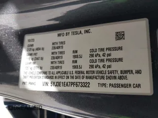 2023 Tesla Model 3 with VIN 5YJ3E1EA7PF673322, listed as a IAAI auction lot 42226767 with 18,367 mi miles and . Bid and sale history available at DreamBid. Image 9.
