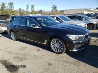 2017 BMW 7 Series 740i xDrive with VIN WBA7E4C58HGU99127, listed as a Copart auction lot 70320002 with 62,489 mi miles. Bid and sale history available at carsss.com. Image 4.