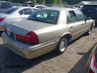 2000 Mercury Grand Marquis LS z VIN 2MEFM75W5YX627647, wystawiony jako IAAI lot #42072795 z przebiegiem 188 113 mil mil oraz . Historia ofert i sprzedaży dostępna na DreamBid. Obrazek 4.