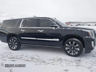 2015 Cadillac Escalade ESV Platinum z VIN 1GYS4UKJ0FR746571, wystawiony jako IAAI lot #38461309 z przebiegiem 65 724 mil mil oraz . Historia ofert i sprzedaży dostępna na DreamBid. Obrazek 13.