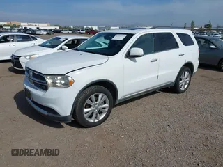 2013 Dodge Durango Crew with VIN 1C4SDHDT2DC679600, listed as a IAAI auction lot 42215737 with 128,499 mi miles and . Bid and sale history available at DreamBid. Image 17.