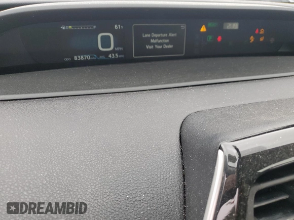 2020 Toyota Prius LE z VIN JTDL9RFU6L3021262, wystawiony jako Copart lot #60809845 z przebiegiem 83 870 mil mil oraz Szkoda całkowita • Salvage title. Historia ofert i sprzedaży dostępna na DreamBid. Obrazek 9.
