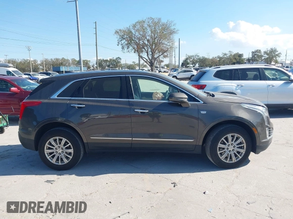 2019 Cadillac XT5 FWD with VIN 1GYKNARS5KZ143510, listed as a IAAI auction lot 41553279 with 53,943 mi miles and . Bid and sale history available at carsss.com. Image 13.