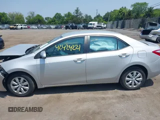 2016 Toyota Corolla L with VIN 5YFBURHE9GP414816, listed as a IAAI auction lot 42424221 with 87,270 mi miles and . Bid and sale history available at DreamBid. Image 14.