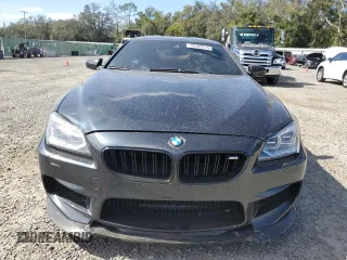 2015 BMW M6 z VIN WBS6C9C51FD467872, wystawiony jako Copart lot #79107574 z przebiegiem 79 139 mil mil oraz Szkoda całkowita • Salvage title. Historia ofert i sprzedaży dostępna na DreamBid. Obrazek 5.