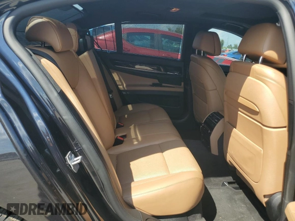 2014 BMW 7 Series 750i xDrive with VIN WBAYB6C53ED225212, listed as a Copart auction lot 71866424 with 122,567 mi miles and Salvage Title. Bid and sale history available at carsss.com. Image 10.