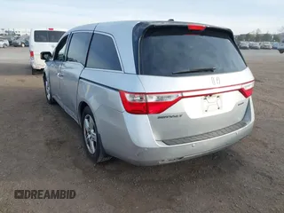 2012 Honda Odyssey Touring with VIN 5FNRL5H96CB095264, listed as a IAAI auction lot 41403450 with 246,199 mi miles and . Bid and sale history available at carsss.com. Image 3.