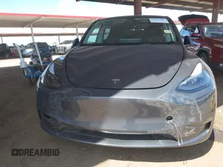 2023 Tesla Model Y Long Range with VIN 7SAYGDEE4PF875915, listed as a IAAI auction lot 42095178 with 11,928 mi miles and . Bid and sale history available at DreamBid. Image 12.