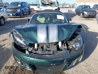 2008 Saturn Sky Red Line with VIN 1G8MF35X58Y118317, listed as a IAAI auction lot 41944739 with 106,223 mi miles. Bid and sale history available at carsss.com. Image 6.