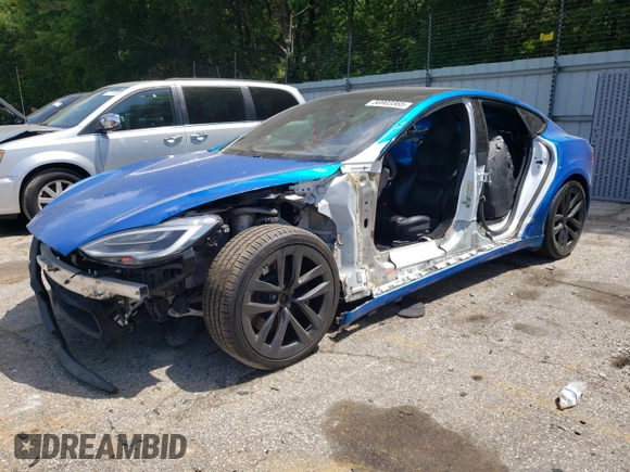 2021 Tesla Model S Plaid with VIN 5YJSA1E64MF438794, listed as a Copart auction lot 56903365 with 63,671 mi miles and Salvage title. Bid and sale history available at DreamBid. Image 1.