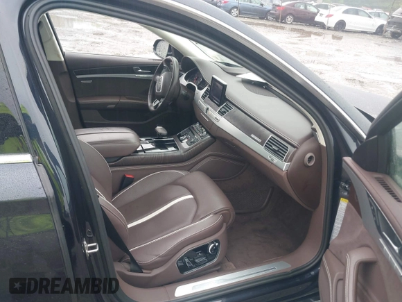 2015 Audi A8 4.0T with VIN WAU32AFD2FN026356, listed as a IAAI auction lot 42330082 with 44,857 mi miles and . Bid and sale history available at DreamBid. Image 5.