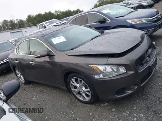2013 Nissan Maxima SV z VIN 1N4AA5AP5DC819199, wystawiony jako IAAI lot #41519631 z przebiegiem 122 934 mil mil oraz . Historia ofert i sprzedaży dostępna na DreamBid. Obrazek 13.