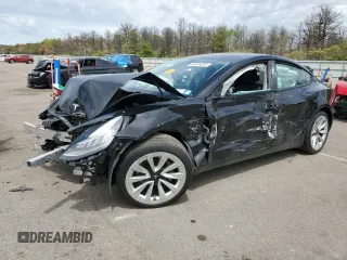 2021 Tesla Model 3 Long Range z VIN 5YJ3E1EBXMF855519, wystawiony jako Copart lot #56676055 z przebiegiem Nie podano mil oraz Szkoda całkowita • Salvage title. Historia ofert i sprzedaży dostępna na DreamBid. Obrazek 1.