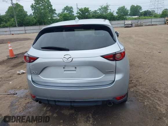 2021 Mazda CX-5 Grand Touring with VIN JM3KFBDM4M0371496, listed as a IAAI auction lot 42428860 with 113,735 mi miles and . Bid and sale history available at DreamBid. Image 17.