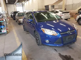 2013 Ford Focus SE with VIN 1FADP3K26DL336078, listed as a IAAI auction lot 41754365 with 104,568 mi miles. Bid and sale history available at carsss.com. Image 1.