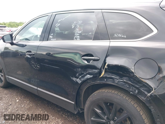 2023 Mazda CX-9 Touring Plus with VIN JM3TCBAY2P0657825, listed as a IAAI auction lot 42756562 with 52,090 mi miles and . Bid and sale history available at DreamBid. Image 14.