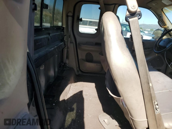 2000 Ford F-150 XL with VIN 1FTRX18L7YKA42575, listed as a Copart auction lot 73034804 with 263,959 mi miles and Non repairable. Bid and sale history available at DreamBid. Image 10.