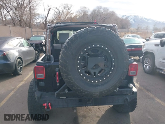 2009 Jeep Wrangler Unlimited Rubicon z VIN 1J4GA69159L749215, wystawiony jako IAAI lot #41489893 z przebiegiem 177 768 mil mil oraz . Historia ofert i sprzedaży dostępna na DreamBid. Obrazek 16.