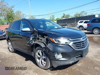 2019 Chevrolet Equinox Premier z VIN 2GNAXXEV0K6172690, wystawiony jako IAAI lot #42284957 z przebiegiem 146 901 mil mil oraz . Historia ofert i sprzedaży dostępna na DreamBid. Obrazek 1.