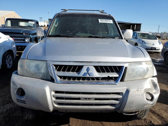 2003 Mitsubishi Montero LTD with VIN JA4NW51S23J039876, listed as a Copart auction lot 88539975 with 181,008 mi miles and Salvage Title. Bid and sale history available at carsss.com. Image 5.