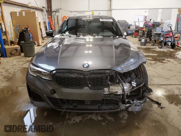2022 BMW 3 Series M340i xDrive with VIN WBA5U9C02NFL66019, listed as a Copart auction lot 86330044 with 42,394 mi miles and Salvage Title. Bid and sale history available at DreamBid. Image 5.