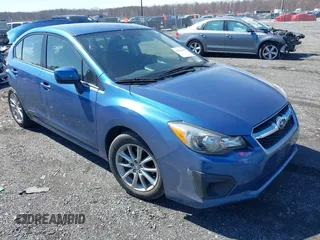 2014 Subaru Impreza Premium with VIN JF1GJAC64EH007565, listed as a IAAI auction lot 41842905 with 15,703 mi miles and . Bid and sale history available at DreamBid. Image 1.
