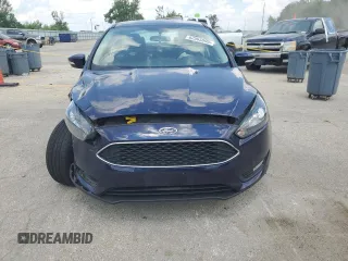 2016 Ford Focus SE z VIN 1FADP3F23GL288232, wystawiony jako Copart lot #62565095 z przebiegiem 11 634 mil mil oraz Szkoda całkowita • Salvage title. Historia ofert i sprzedaży dostępna na DreamBid. Obrazek 5.