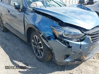 2016 Mazda CX-5 Grand Touring with VIN JM3KE4DY0G0629924, listed as a IAAI auction lot 41878154 with 78,196 mi miles. Bid and sale history available at carsss.com. Image 17.
