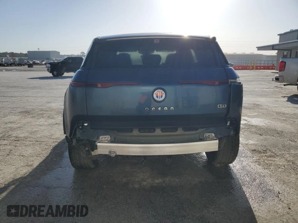 2023 Fisker Ocean One z VIN VCF1ZBU29PG003532, wystawiony jako Copart lot #50955695 z przebiegiem 13 922 mil mil oraz Szkody całkowita. Historia ofert i sprzedaży dostępna na DreamBid. Obrazek 6.