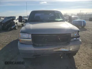 2001 GMC Sierra 1500HD SLE z VIN 1GTGK13U51F165800, wystawiony jako Copart lot #82983364 z przebiegiem 139 686 mil mil oraz Szkody całkowita. Historia ofert i sprzedaży dostępna na DreamBid. Obrazek 5.