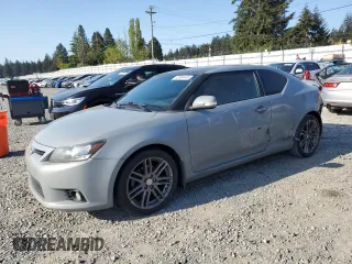 2011 Scion tC with VIN JTKJF5C76B3000765, listed as a Copart auction lot 53954445 with 243,554 mi miles and Salvage Title. Bid and sale history available at carsss.com. Image 1.