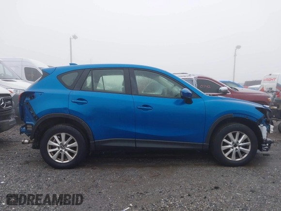 2013 Mazda CX-5 Sport with VIN JM3KE4BE9D0157890, listed as a IAAI auction lot 40998406 with 134,087 mi miles. Bid and sale history available at carsss.com. Image 13.