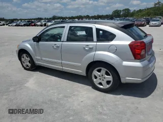 2009 Dodge Caliber SXT with VIN 1B3HB48A49D142621, listed as a Copart auction lot 55934095 with 158,885 mi miles and Non Repairable. Bid and sale history available at DreamBid. Image 2.