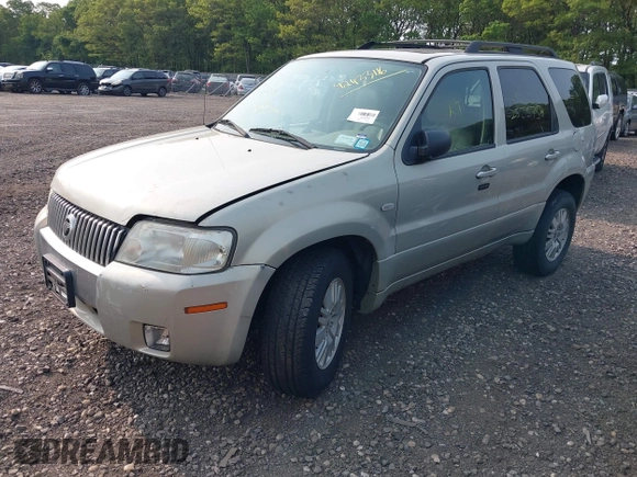 2005 Mercury Mariner Luxury with VIN 4M2YU57105DJ32592, listed as a IAAI auction lot 42433116 with Not provided miles and . Bid and sale history available at DreamBid. Image 2.