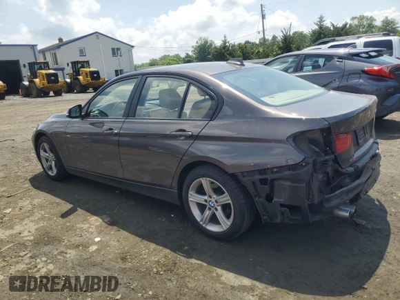 2013 BMW 3 Series 328i xDrive with VIN WBA3B5G58DNS02015, listed as a Copart auction lot 58586515 with 241,767 mi miles and Salvage title. Bid and sale history available at DreamBid. Image 2.