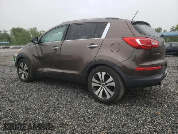 2011 Kia Sportage EX with VIN KNDPC3A2XB7080957, listed as a Copart auction lot 54665855 with 191,076 mi miles and Salvage title. Bid and sale history available at DreamBid. Image 2.