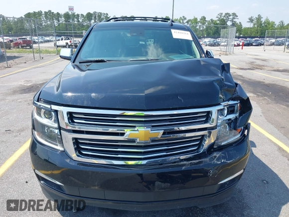 2019 Chevrolet Suburban LT with VIN 1GNSCJKC5KR304766, listed as a IAAI auction lot 42410264 with 105,171 mi miles and . Bid and sale history available at DreamBid. Image 12.