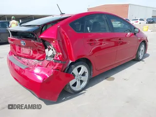 2012 Toyota Prius One with VIN JTDKN3DU8C5499775, listed as a IAAI auction lot 42065022 with 104,499 mi miles and . Bid and sale history available at carsss.com. Image 4.