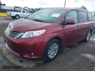 2016 Toyota Sienna XLE with VIN 5TDYK3DC5GS713664, listed as a IAAI auction lot 41933573 with 98,484 mi miles. Bid and sale history available at carsss.com. Image 19.