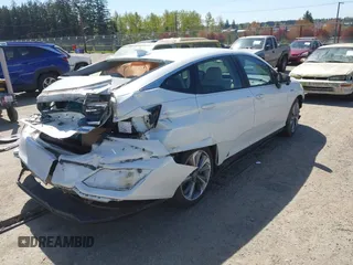 2019 Honda Clarity with VIN JHMZC5F1XKC007033, listed as a IAAI auction lot 42064611 with 28,458 mi miles. Bid and sale history available at carsss.com. Image 4.