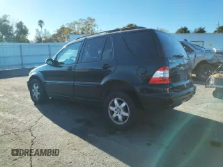 2003 Mercedes-Benz M-Class 3.7L with VIN 4JGAB57EX3A445949, listed as a Copart auction lot 74633744 with 223,427 mi miles and Salvage Title. Bid and sale history available at carsss.com. Image 2.
