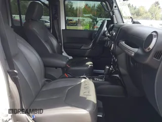 2016 Jeep Wrangler Unlimited Sport z VIN 1C4HJWDG5GL308803, wystawiony jako IAAI lot #42181473 z przebiegiem 41 621 mil mil oraz . Historia ofert i sprzedaży dostępna na DreamBid. Obrazek 5.