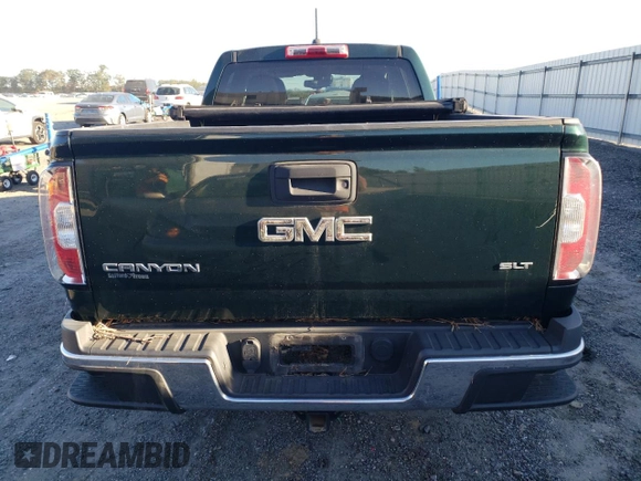 2015 GMC Canyon 4WD SLT with VIN 1GTG6CE35F1246241, listed as a Copart auction lot 74748254 with 126,389 mi miles and Salvage Title. Bid and sale history available at carsss.com. Image 6.