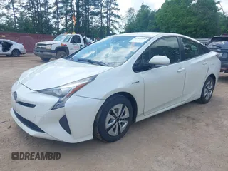 2017 Toyota Prius Two with VIN JTDKARFUXH3040780, listed as a IAAI auction lot 42091493 with 105,952 mi miles and . Bid and sale history available at DreamBid. Image 2.