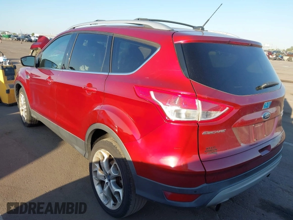 2013 Ford Escape Titanium with VIN 1FMCU0J96DUA57425, listed as a IAAI auction lot 40458653 with 121,929 mi miles. Bid and sale history available at carsss.com. Image 3.