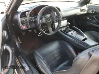 2003 Honda S2000 with VIN JHMAP11483T006461, listed as a Copart auction lot 52099995 with 187,376 mi miles and Salvage Title. Bid and sale history available at DreamBid. Image 8.