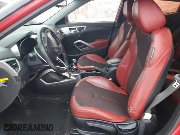 2012 Hyundai Veloster w/Red Int z VIN KMHTC6AD4CU077956, wystawiony jako Copart lot #43504505 z przebiegiem 103 183 mil mil oraz Szkoda całkowita • Salvage title. Historia ofert i sprzedaży dostępna na DreamBid. Obrazek 7.