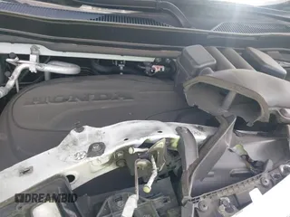 2022 Honda Pilot Touring 7-Passenger z VIN 5FNYF5H67NB027356, wystawiony jako IAAI lot #42080323 z przebiegiem 56 826 mil mil oraz . Historia ofert i sprzedaży dostępna na DreamBid. Obrazek 10.
